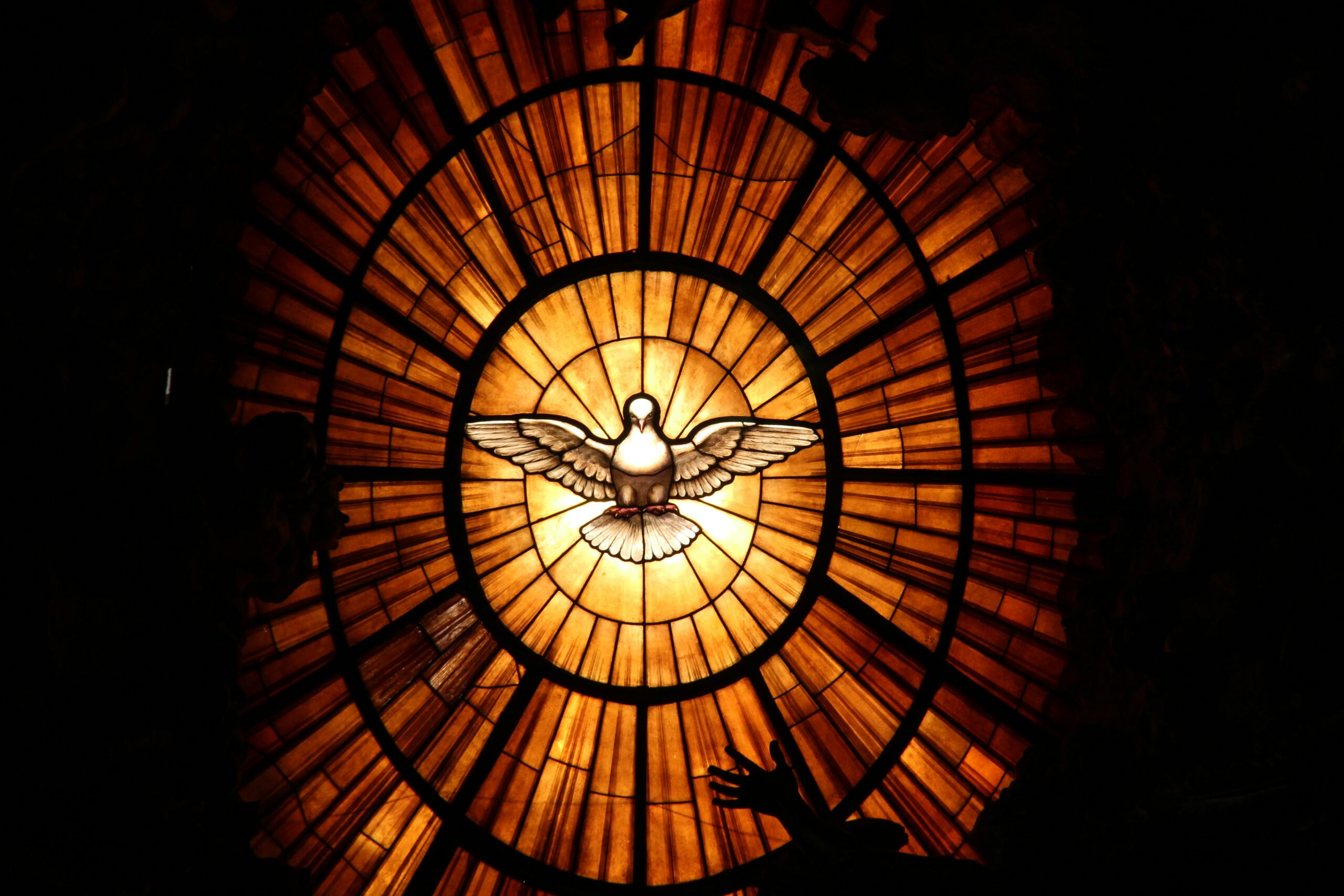 Stained glass representation of dependence on the Holy Spirit